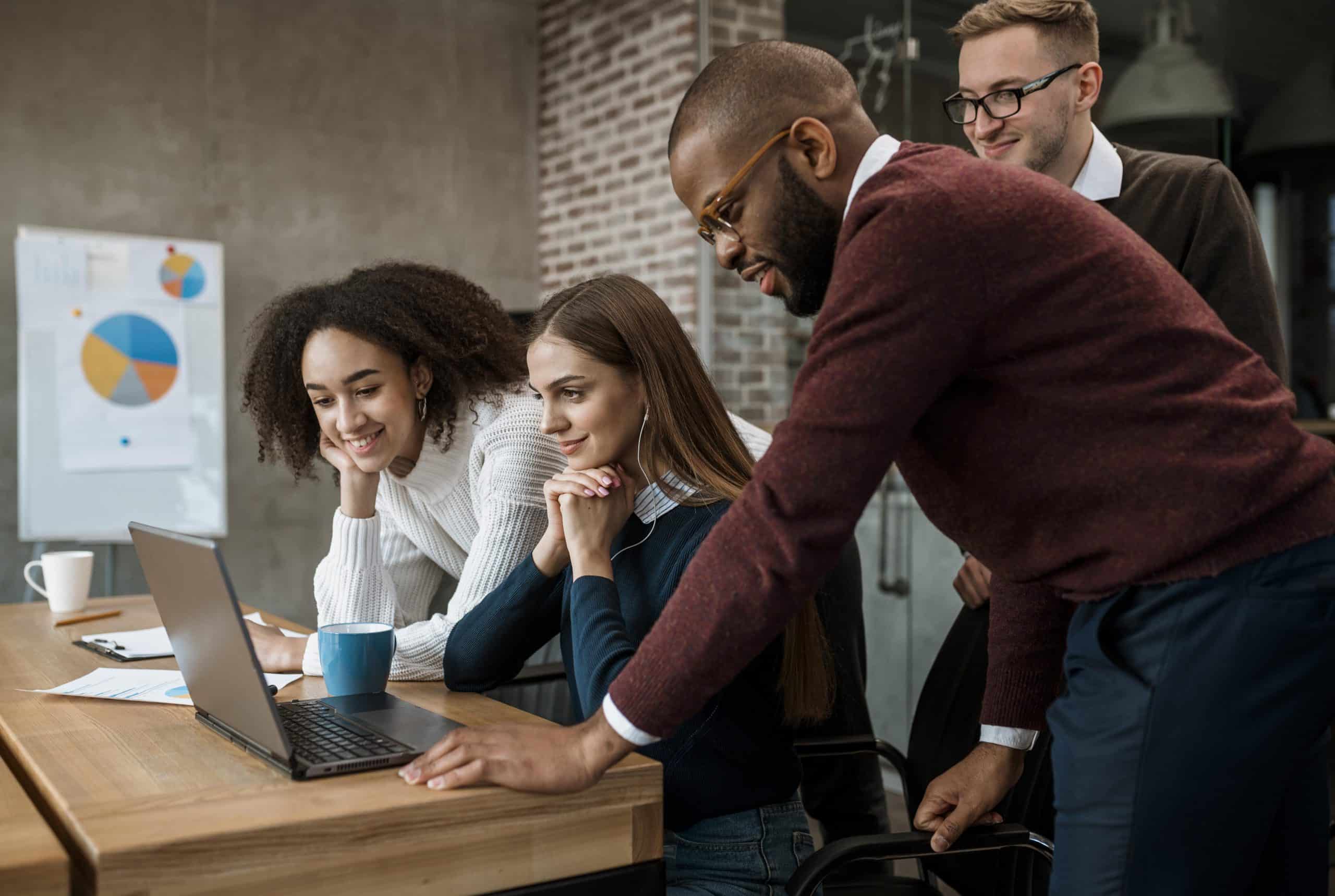 Woman Showing Something Her Colleagues During Meeting